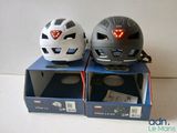 two helmets that are sitting on top of each other