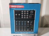 an image of a boxed box of audio mixers sitting on a table