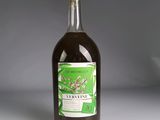 a bottle of wine that is sitting on a table