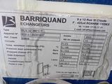 a close up of a label on a blue tank with a hose