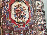 a large oriental rug on the floor in a room