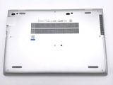 the bottom of a laptop with the bottom cover partially open