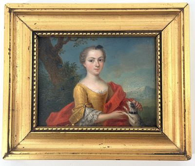 tableau représentant une femme tenant un chien, dans un cadre doré