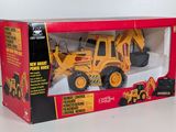 toy construction vehicle in box on white surface with white background