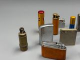many different types of lighters and lighter lighters on a table