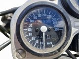 a close up of a speedometer on a motorcycle