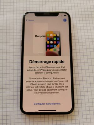 iPhone X avec le message « démarrage rapide » affiché à l'écran