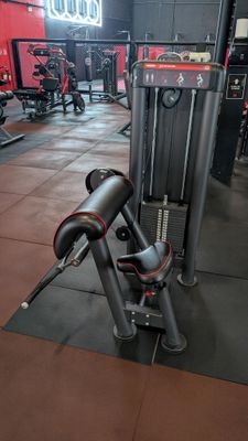 an image of a gym room with equipment in it