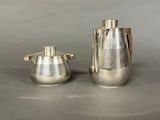 pair of silver plated sugar and pepper shakers