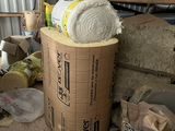a pile of cardboard and other items in a storage area