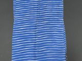 a blue and white striped towel on a black background