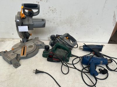 many tools that are laying out on the floor