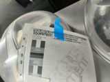 a piece of paper taped to the side of a machine