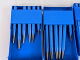 a bunch of blue pens in a blue case