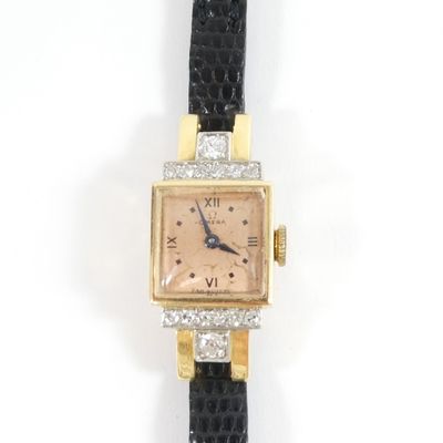 an image of a lady ' s wrist watch with diamonds on it