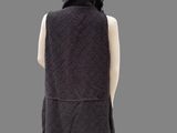 black hoodedie vest with fringes and hoodie on mannequin
