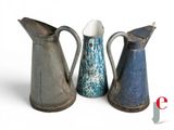 three different types of jugs sitting next to each other