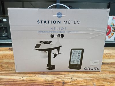 an image of a box with a weather station on top of it