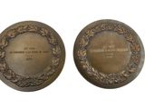 two bronze plaques depicting the names of the people who fought in world war i