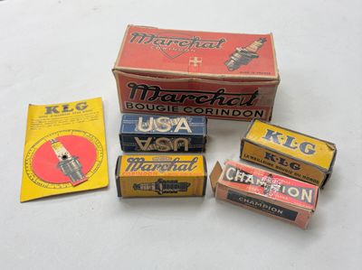 several boxes of matchsticks are sitting on a table