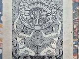 an old book with a drawing of a tree on it