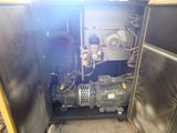 a machine that is sitting inside of a metal cabinet