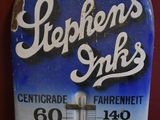 a blue and white thermometer with the word stephen ' s skis on it