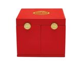 a red box with gold handles and handles on a white background