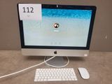 a computer with a mouse and a keyboard on the desk