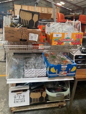 many boxes of food on a shelf in a warehouse