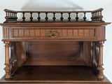 a small wooden table with a shelf on top of it