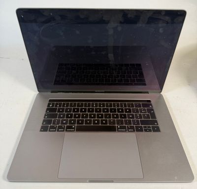 an image of a laptop computer sitting on top of a white table