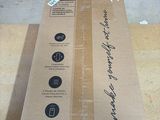 a cardboard box on a table with instructions on it