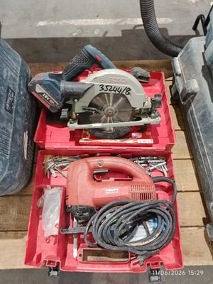 a red tool box with a circular saw and a corded circular saw