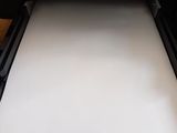 the printer is sitting on top of the paper and ready to print