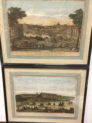 deux reproductions encadrées représentant une vue de la ville et d'une rivière