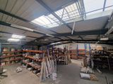 a large room with a lot of shelves and shelves