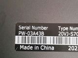label of serial number on the side of a laptop computer