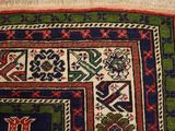 a close up of a rug with a design on it