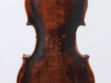 an old violin with a wooden back and a long neck