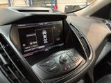 the dashboard of a car with a digital display in the center