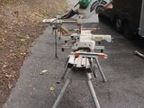 a machine that is sitting on a tripod on the side of the road