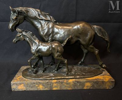 statue of a horse and foal with a foal on a marble base
