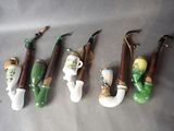 four different types of pipe smokings are lined up on a table