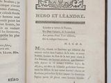 an open book with a picture of a bird on it