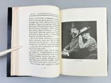 an open book with a picture of a man and a woman on it