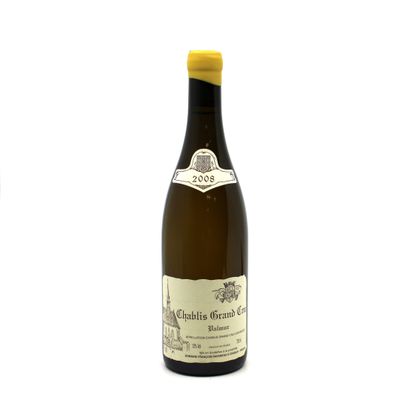 a bottle of wine that is sitting on a table