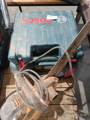 a picture of a tool box and a corded saw