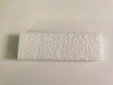 a piece of paper on the table next to a toothbrush