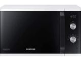 Le four à micro-ondes Samsung est blanc et dispose d'une minuterie sur le côté.